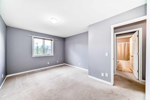 156 Simcoe Place Sw, Calgary, AB - Indoor Photo Showing Other Room