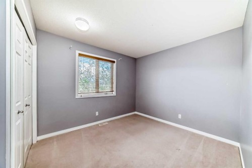156 Simcoe Place Sw, Calgary, AB - Indoor Photo Showing Other Room