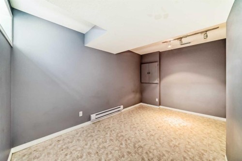 156 Simcoe Place Sw, Calgary, AB - Indoor Photo Showing Other Room
