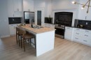 3 Strathridge Bay Sw, Calgary, AB  - Indoor Photo Showing Kitchen With Double Sink 