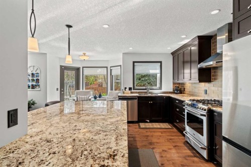 186 Mt Assiniboine Circle Se, Calgary, AB - Indoor Photo Showing Kitchen With Double Sink With Upgraded Kitchen