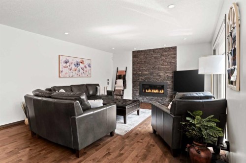 186 Mt Assiniboine Circle Se, Calgary, AB - Indoor Photo Showing Living Room With Fireplace