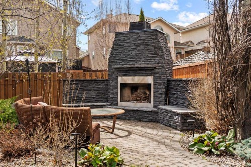 186 Mt Assiniboine Circle Se, Calgary, AB - Outdoor With Fireplace