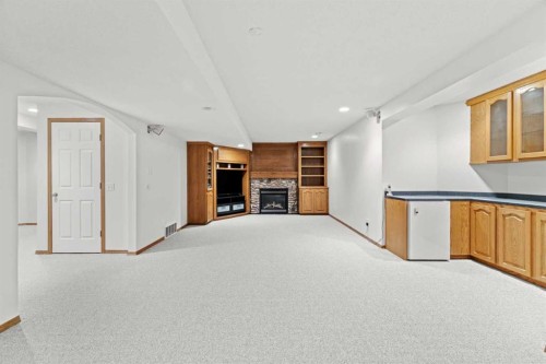 186 Mt Assiniboine Circle Se, Calgary, AB - Indoor With Fireplace