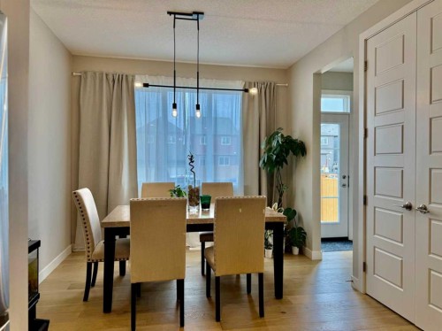 399 Sora Boulevard Se, Calgary, AB - Indoor Photo Showing Dining Room