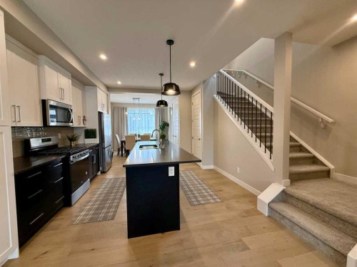 399 Sora Boulevard Se, Calgary, AB - Indoor Photo Showing Kitchen With Upgraded Kitchen