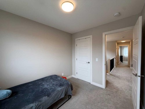 399 Sora Boulevard Se, Calgary, AB - Indoor Photo Showing Bedroom