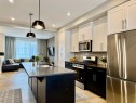399 Sora Boulevard Se, Calgary, AB  - Indoor Photo Showing Kitchen With Upgraded Kitchen 