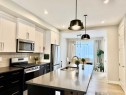 399 Sora Boulevard Se, Calgary, AB  - Indoor Photo Showing Kitchen With Double Sink With Upgraded Kitchen 