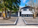 347 Queensland Drive Se, Calgary, AB  - Outdoor With Facade 