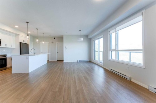 2410-42 Cranbrook Gardens Se, Calgary, AB - Indoor Photo Showing Kitchen With Upgraded Kitchen