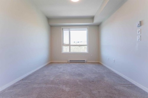 2410-42 Cranbrook Gardens Se, Calgary, AB - Indoor Photo Showing Other Room