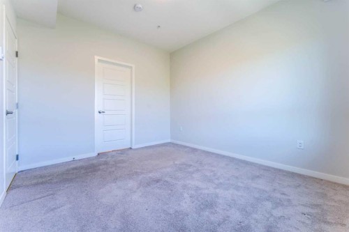 2410-42 Cranbrook Gardens Se, Calgary, AB - Indoor Photo Showing Other Room