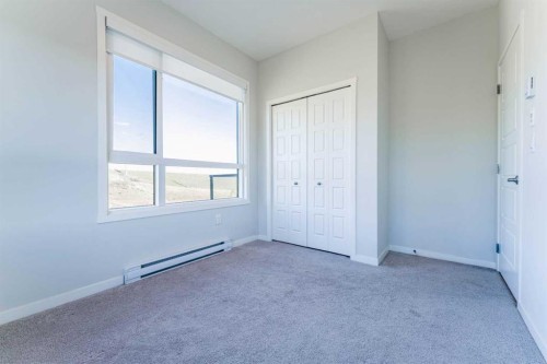 2410-42 Cranbrook Gardens Se, Calgary, AB - Indoor Photo Showing Other Room