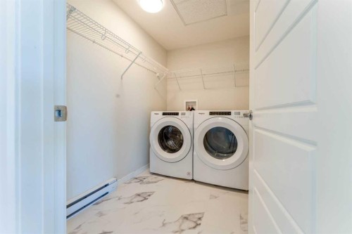 2410-42 Cranbrook Gardens Se, Calgary, AB - Indoor Photo Showing Laundry Room