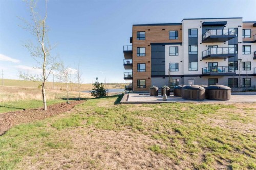 2410-42 Cranbrook Gardens Se, Calgary, AB - Outdoor With Balcony
