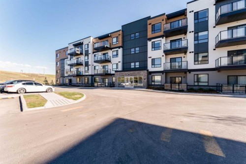 2410-42 Cranbrook Gardens Se, Calgary, AB - Outdoor With Balcony