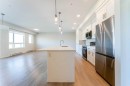 2410-42 Cranbrook Gardens Se, Calgary, AB  - Indoor Photo Showing Kitchen With Stainless Steel Kitchen With Upgraded Kitchen 