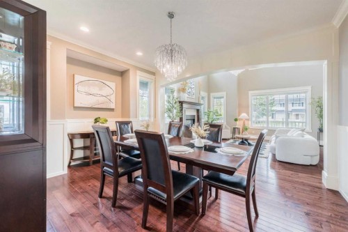 5615 19 Street Sw, Calgary, AB - Indoor Photo Showing Dining Room With Fireplace