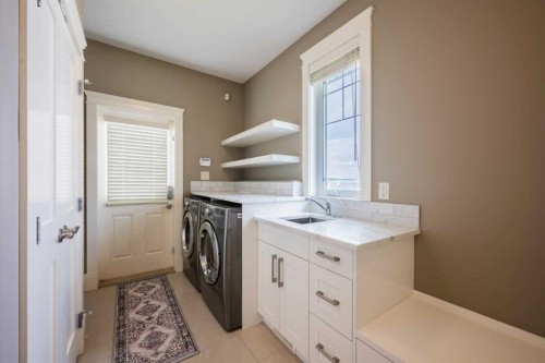 5615 19 Street Sw, Calgary, AB - Indoor Photo Showing Laundry Room