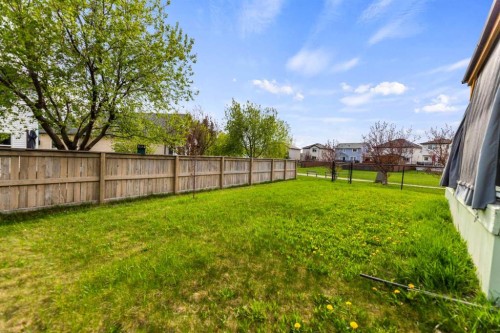 7 Country Hills Park Nw, Calgary, AB - Outdoor With Backyard