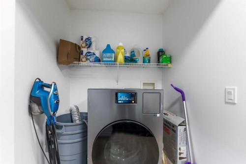 7 Country Hills Park Nw, Calgary, AB - Indoor Photo Showing Laundry Room