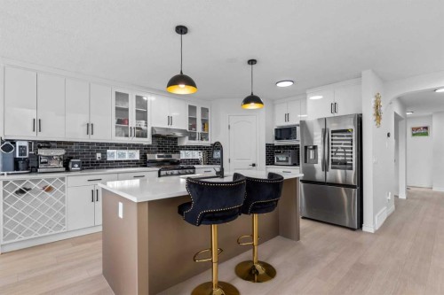 7 Country Hills Park Nw, Calgary, AB - Indoor Photo Showing Kitchen With Stainless Steel Kitchen With Upgraded Kitchen