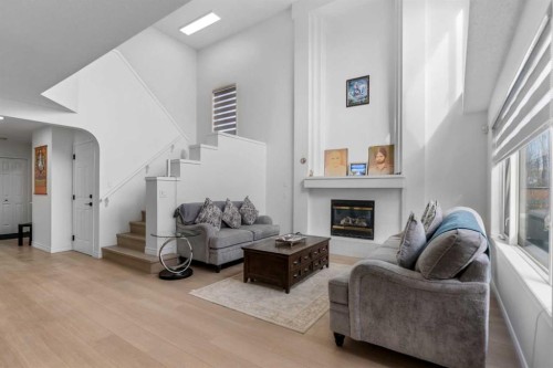 7 Country Hills Park Nw, Calgary, AB - Indoor Photo Showing Other Room With Fireplace