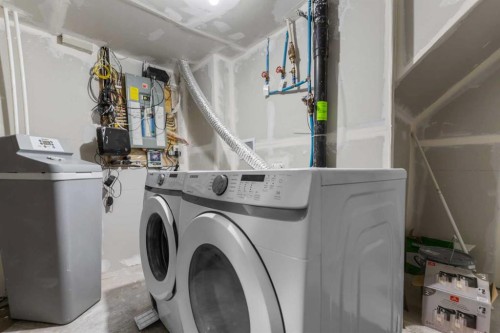 7 Country Hills Park Nw, Calgary, AB - Indoor Photo Showing Laundry Room