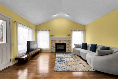 18 Shannon Terrace Sw, Calgary, AB - Indoor Photo Showing Living Room With Fireplace