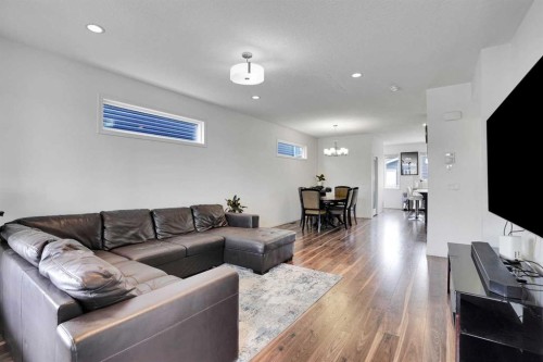 726 Redstone Drive Ne, Calgary, AB - Indoor Photo Showing Living Room