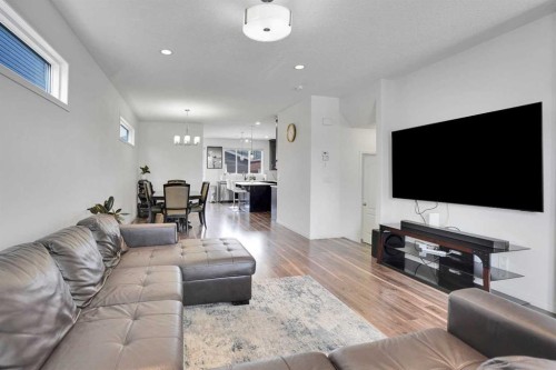 726 Redstone Drive Ne, Calgary, AB - Indoor Photo Showing Living Room