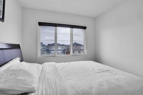 726 Redstone Drive Ne, Calgary, AB - Indoor Photo Showing Bedroom