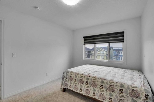726 Redstone Drive Ne, Calgary, AB - Indoor Photo Showing Bedroom