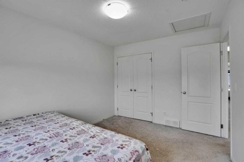 726 Redstone Drive Ne, Calgary, AB - Indoor Photo Showing Bedroom