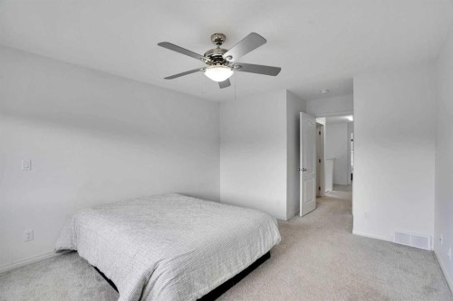 726 Redstone Drive Ne, Calgary, AB - Indoor Photo Showing Bedroom
