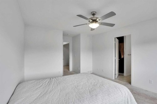 726 Redstone Drive Ne, Calgary, AB - Indoor Photo Showing Bedroom