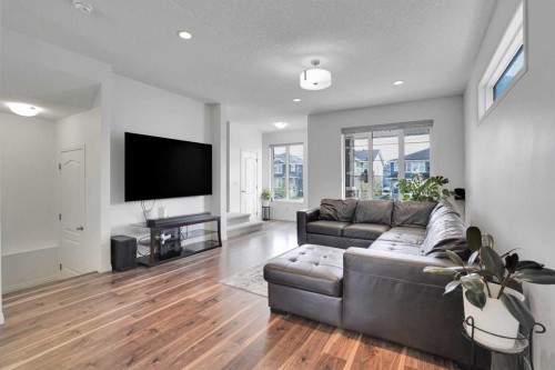 726 Redstone Drive Ne, Calgary, AB - Indoor Photo Showing Living Room