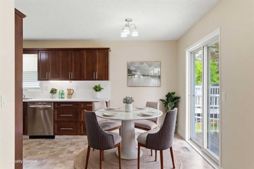 34 Vandoos Gardens Nw, Calgary, AB - Indoor Photo Showing Dining Room