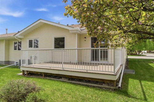 34 Vandoos Gardens Nw, Calgary, AB - Outdoor With Deck Patio Veranda