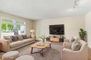34 Vandoos Gardens Nw, Calgary, AB  - Indoor Photo Showing Living Room 
