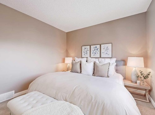 292 Coventry Close Ne, Calgary, AB - Indoor Photo Showing Bedroom