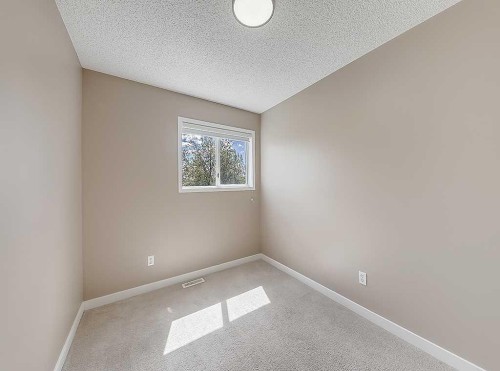 292 Coventry Close Ne, Calgary, AB - Indoor Photo Showing Other Room