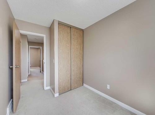 292 Coventry Close Ne, Calgary, AB - Indoor Photo Showing Other Room