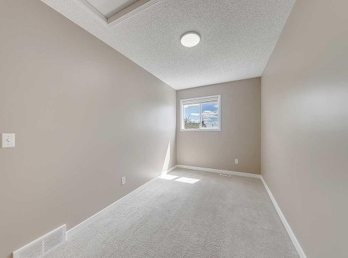 292 Coventry Close Ne, Calgary, AB - Indoor Photo Showing Other Room