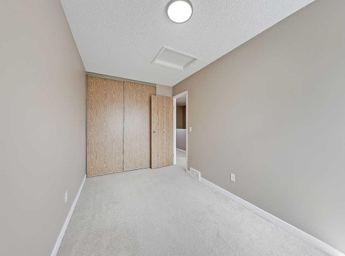 292 Coventry Close Ne, Calgary, AB - Indoor Photo Showing Other Room