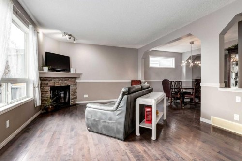 34 Morningside Landing Sw, Airdrie, AB - Indoor With Fireplace