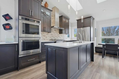 38 Sandpiper Way Nw, Calgary, AB - Indoor Photo Showing Kitchen With Upgraded Kitchen