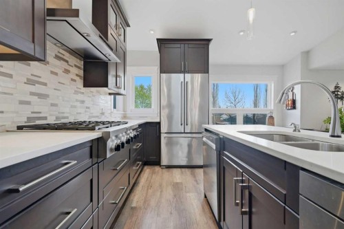 38 Sandpiper Way Nw, Calgary, AB - Indoor Photo Showing Kitchen With Double Sink With Upgraded Kitchen