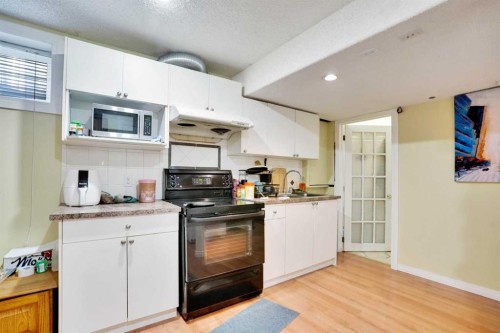 143 Taralea Gardens Ne, Calgary, AB - Indoor Photo Showing Kitchen With Double Sink